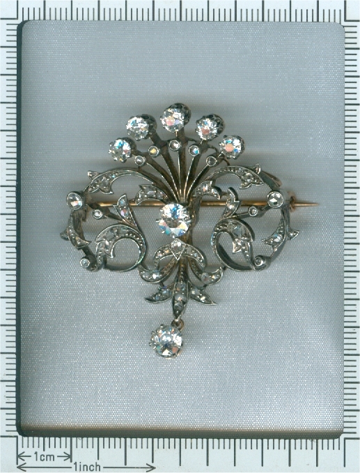 Antique diamond set pendant and brooch in peacock tail model